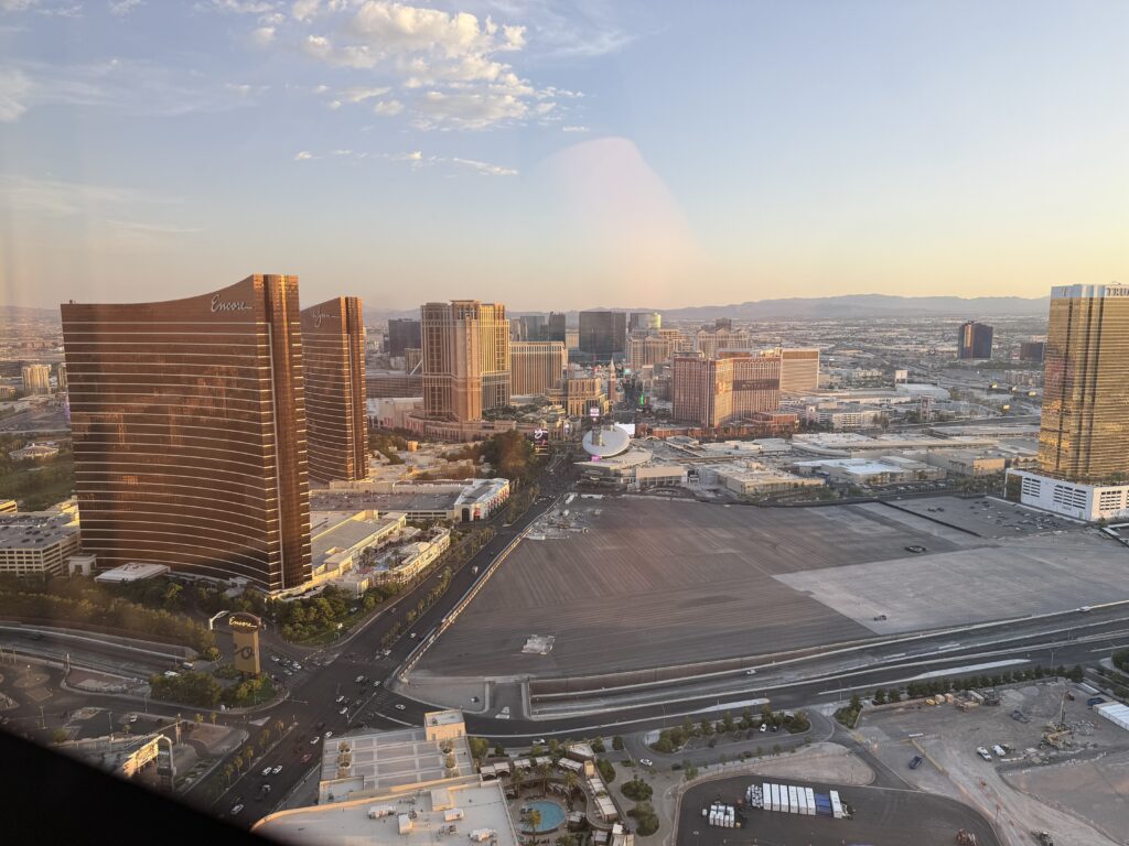 A large, paved parcel of land between Wynn/Encore and Trump Tower.