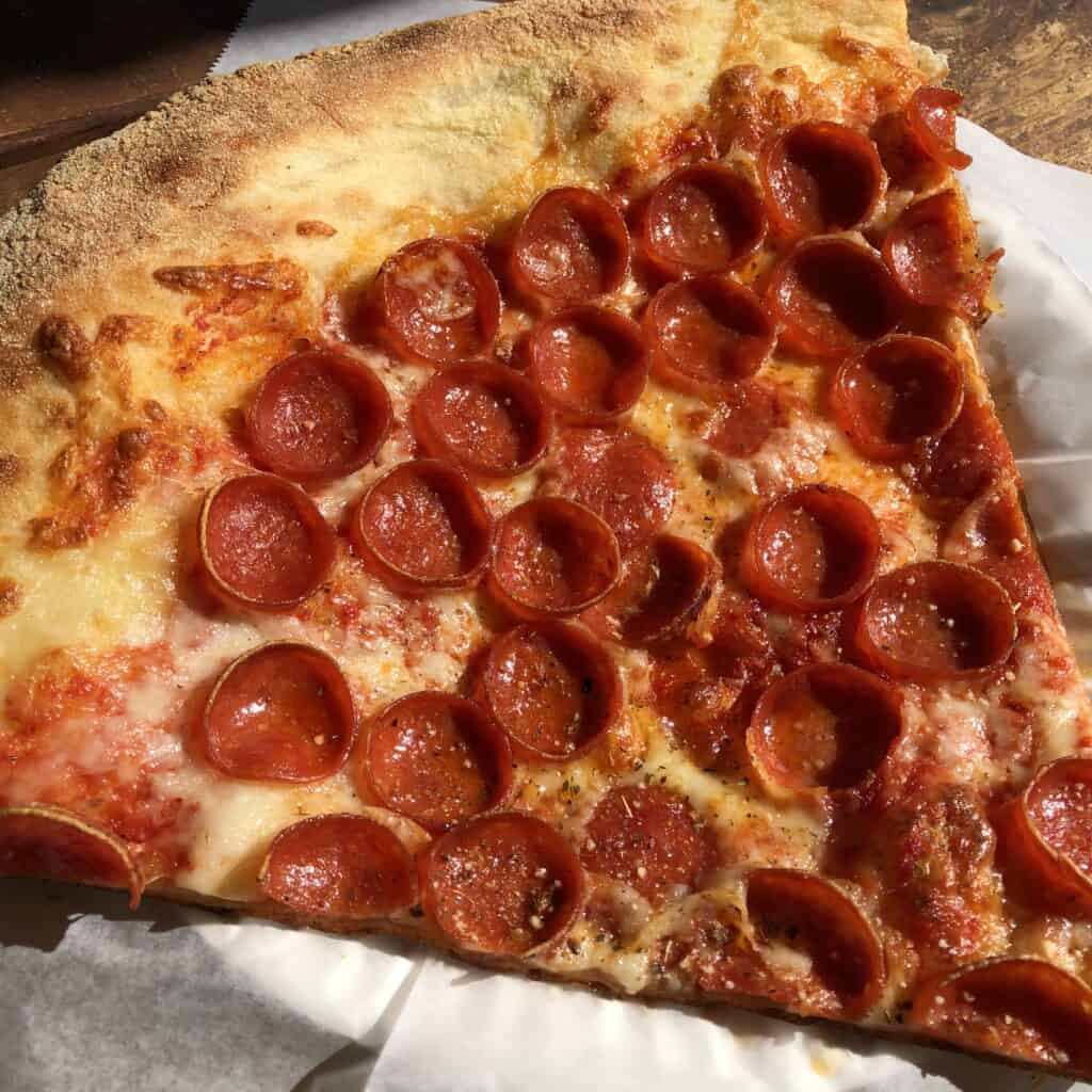 Massive slice of pepperoni pizza from Pizza Rock at Downtown Grand