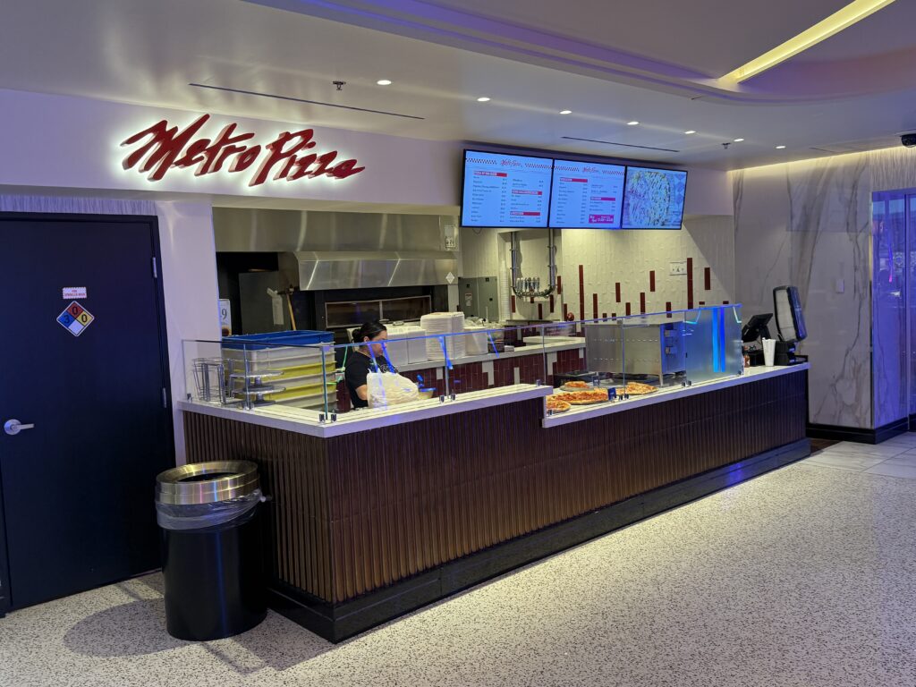 Exterior of Metro Pizza at Ellis Island.