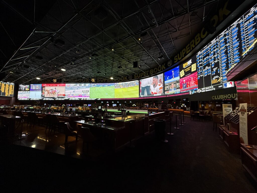 a long, massive video board overhead in the sportsbook.
