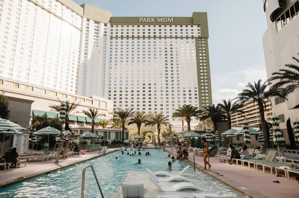 A rectangular pool at Park MGM with the hotel tower visible behind it.