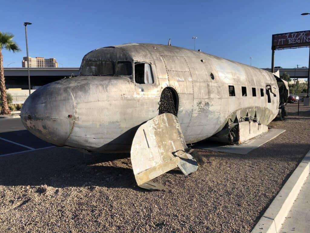 Damaged airplane display outdoors at Area15