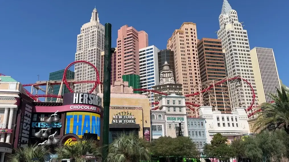 NYNY's facade from across the street with the rollerocaster track visible on the roofline.