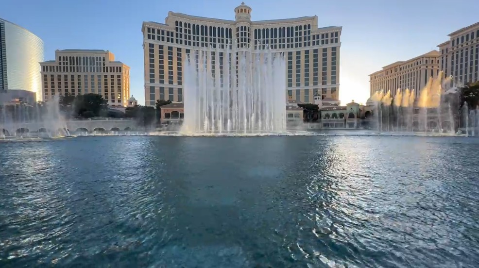 Foutains shooting up in front of Bellagio's hotel tower in the background.