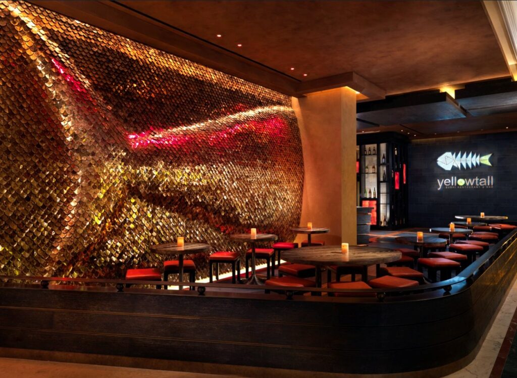 Yellowtail's entrance, which is marked by a massive bronze fish tail on the wall as art. 