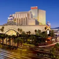 Exterior of Harrah's Las Vegas at dusk.