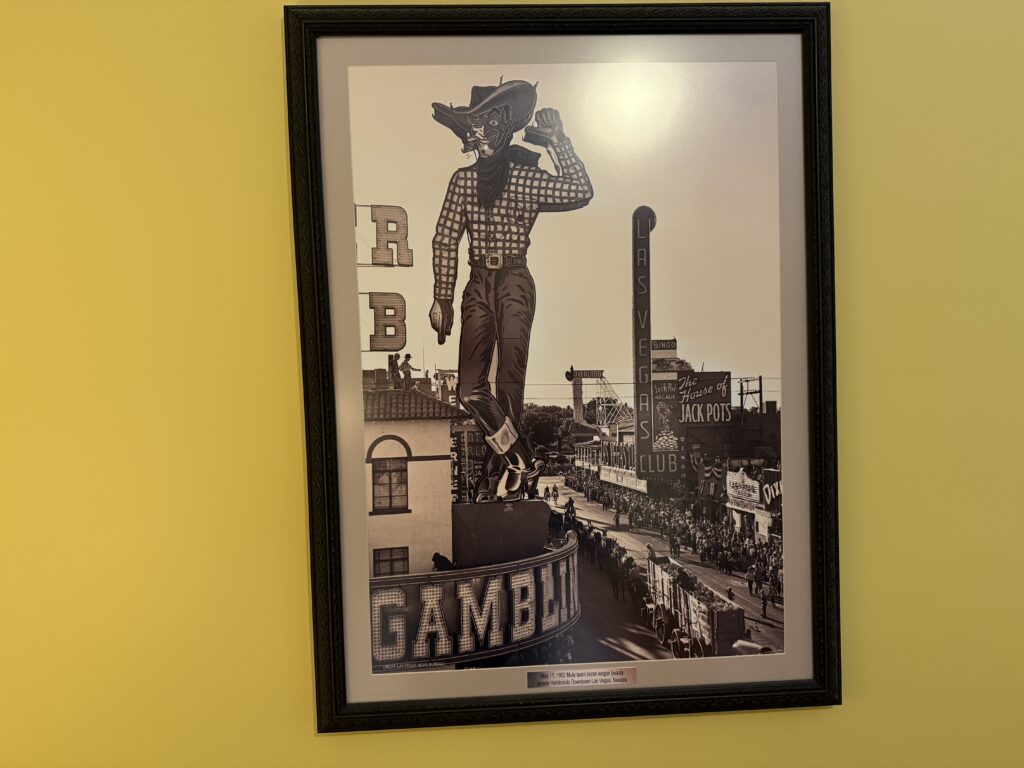 A picture from decades ago showing Vegas Vic posted above a long gone casino. 