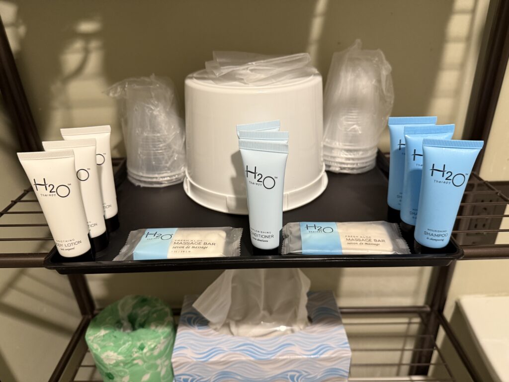 Bath products on a rack, provided by H2O therapy. 