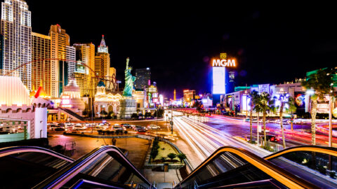 A long exposure of the Las Vegas Strip at night with car headlinghts on the Strip blurred