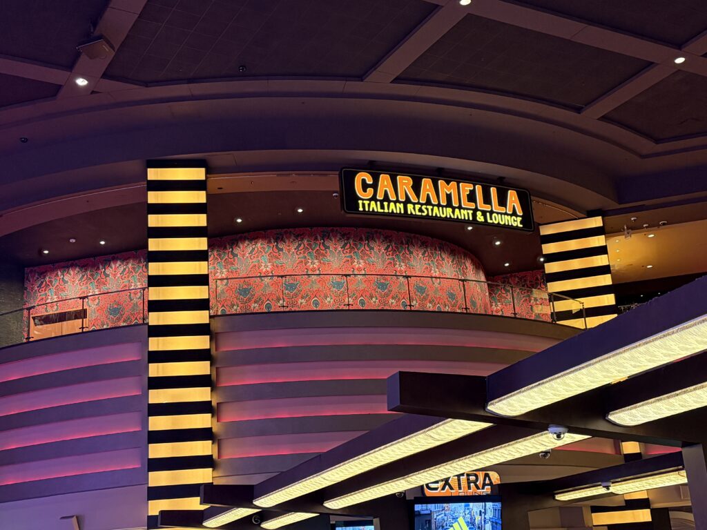 Exterior of Caramella at Planet Hollywood from the casino floor below.