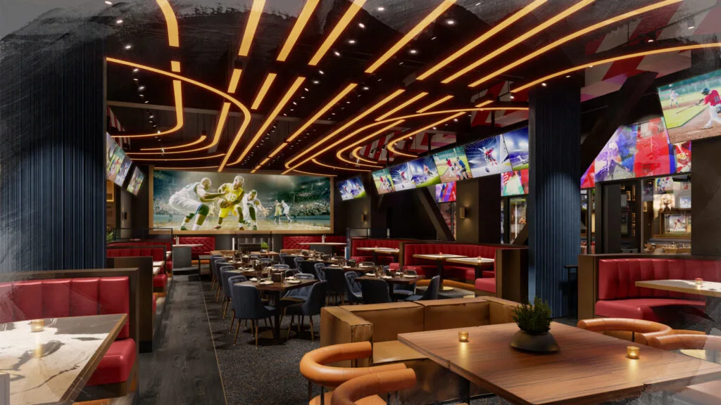 Seating at Flanker sports bar surrounded by TVs. In the background is a large video wall covering the entire wall.