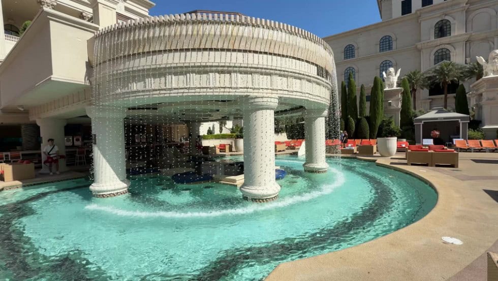 Swim up blackjack tables in a pool at Caesars Palace.