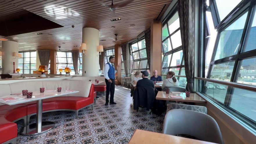 Interior of Giada, sitting along large windows overlooking the Strip.