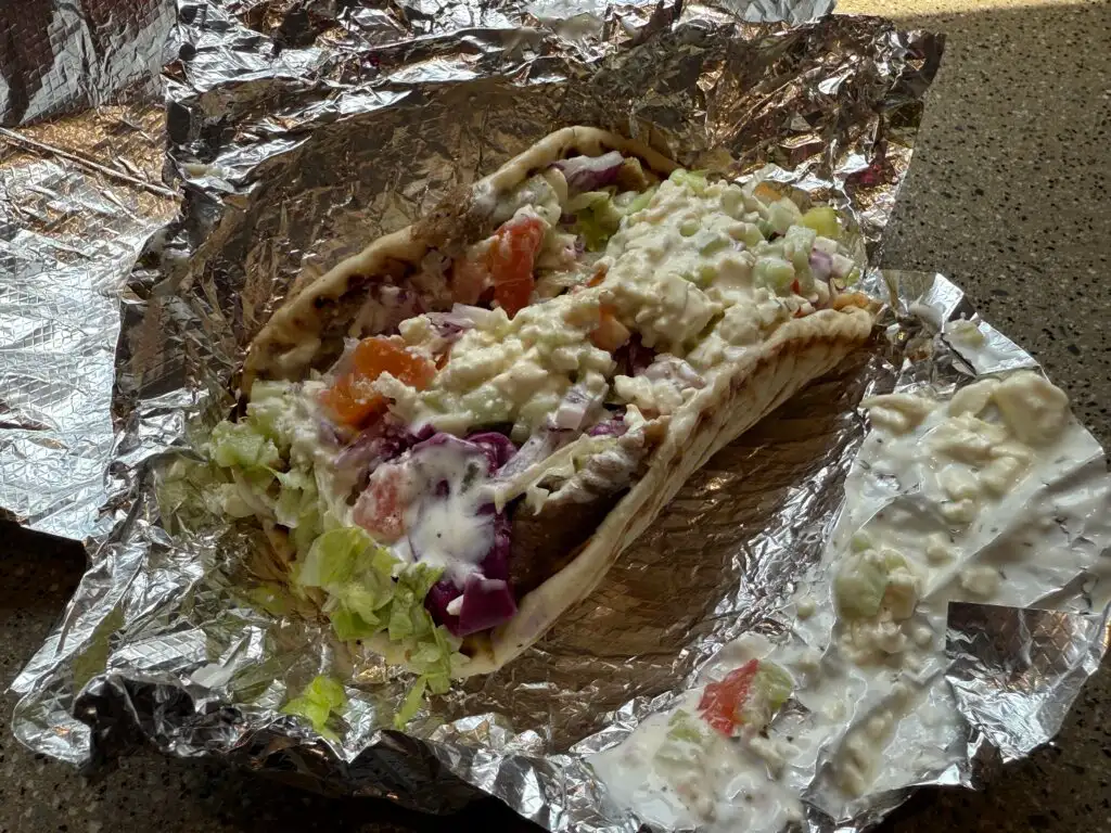 A fat gyro on tin foil. 