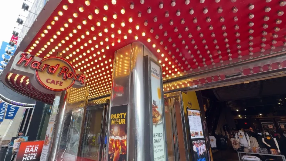 Exterior signage above the entrance of the Hard Rock Cafe.