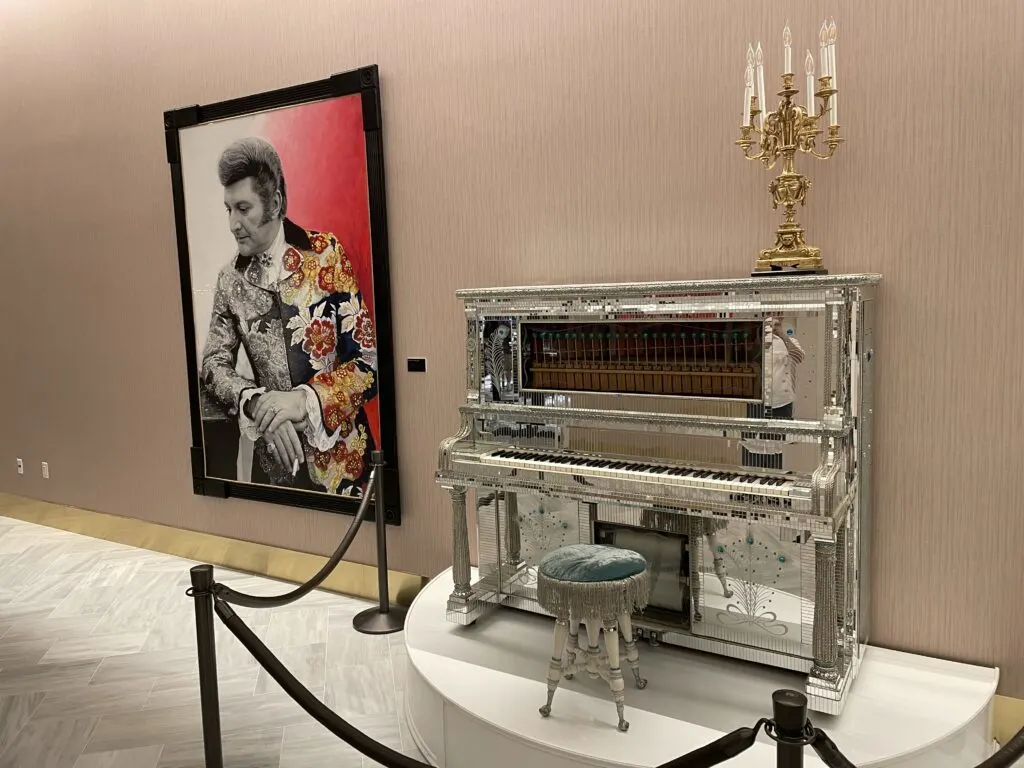 Liberace mural and piano