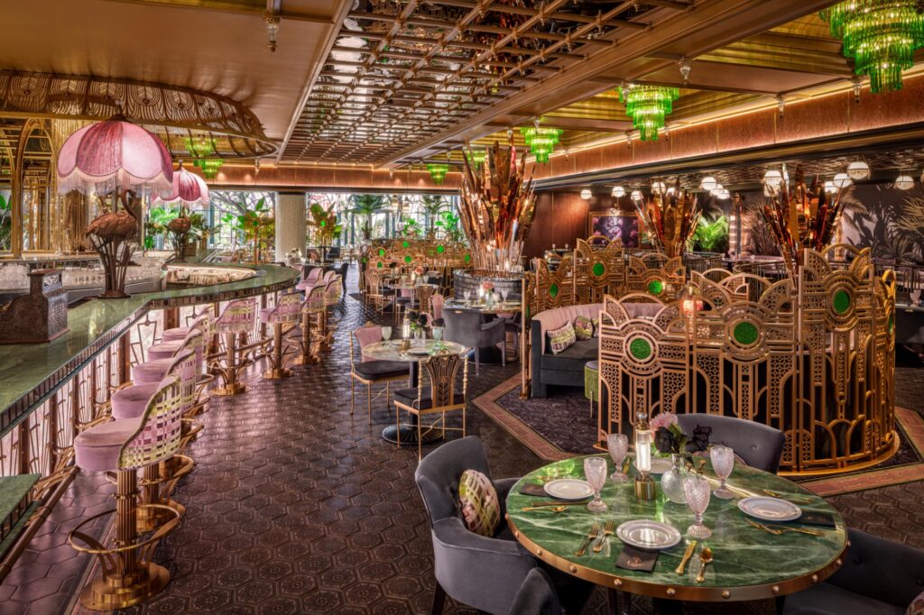 Interior of Pinkey's, which has a victorian theme, a lot of stained glass, and elegance.