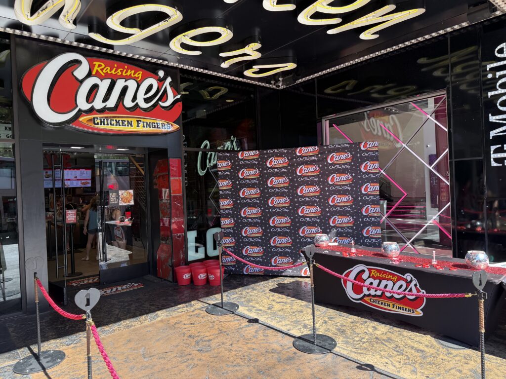 Exteror entrance of Raisin' Canes in the Showcase Mall.