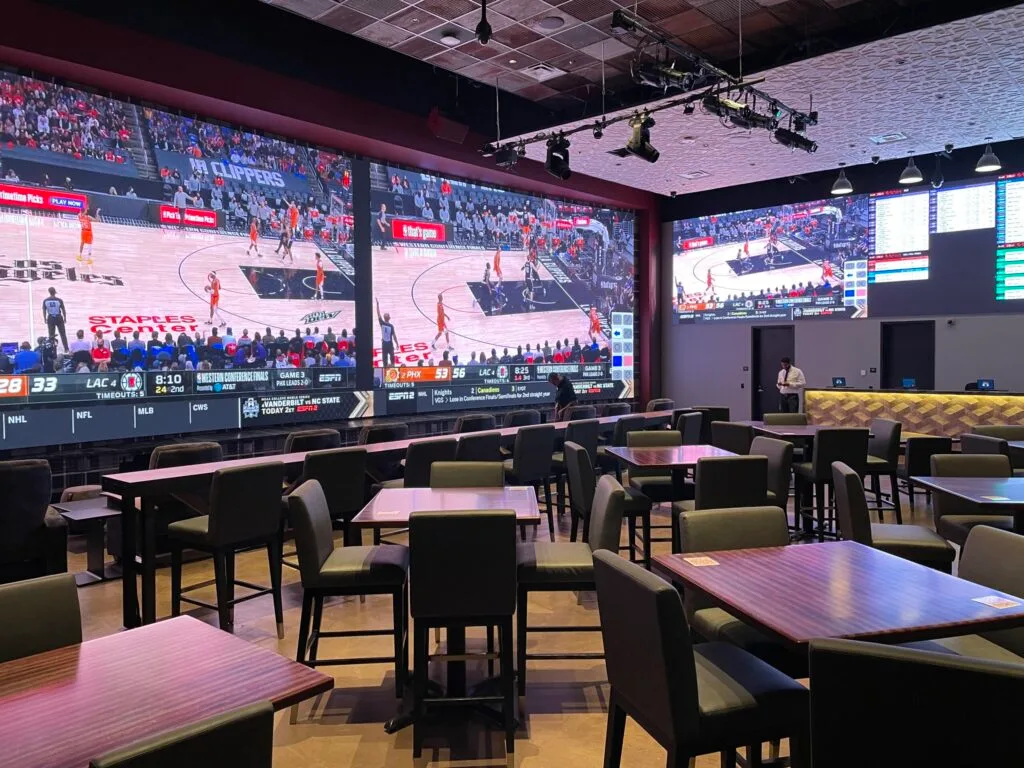 Sportsbook screens at Resorts World