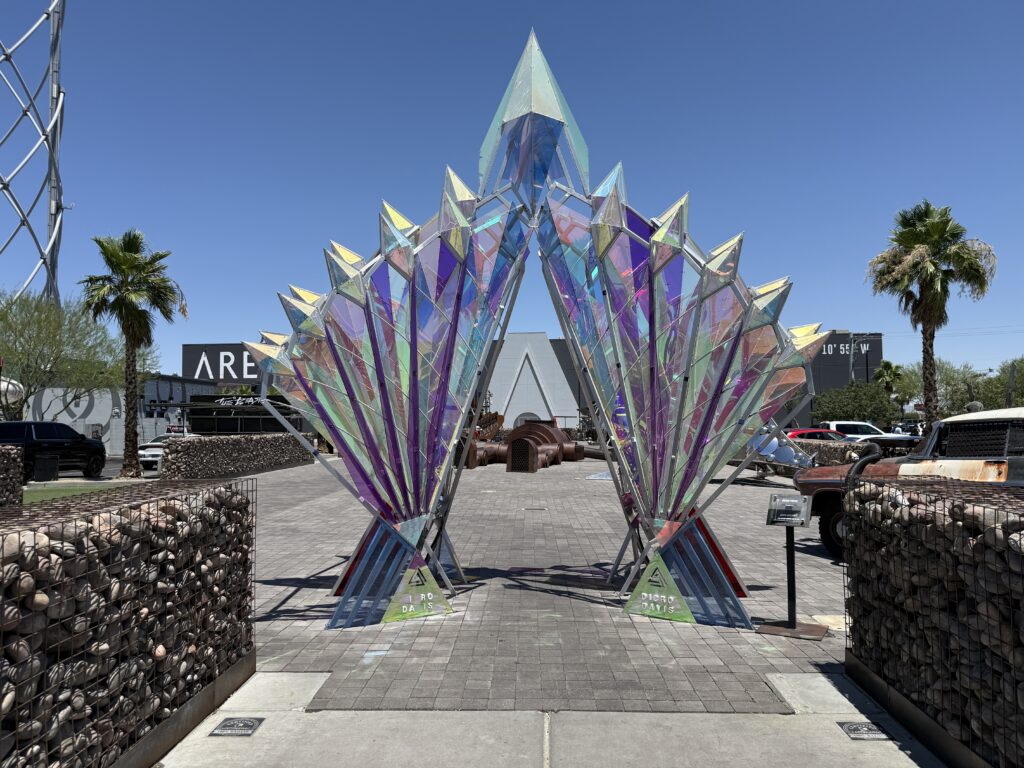A prismatic display forms an arch you walk under to enter Art Island.