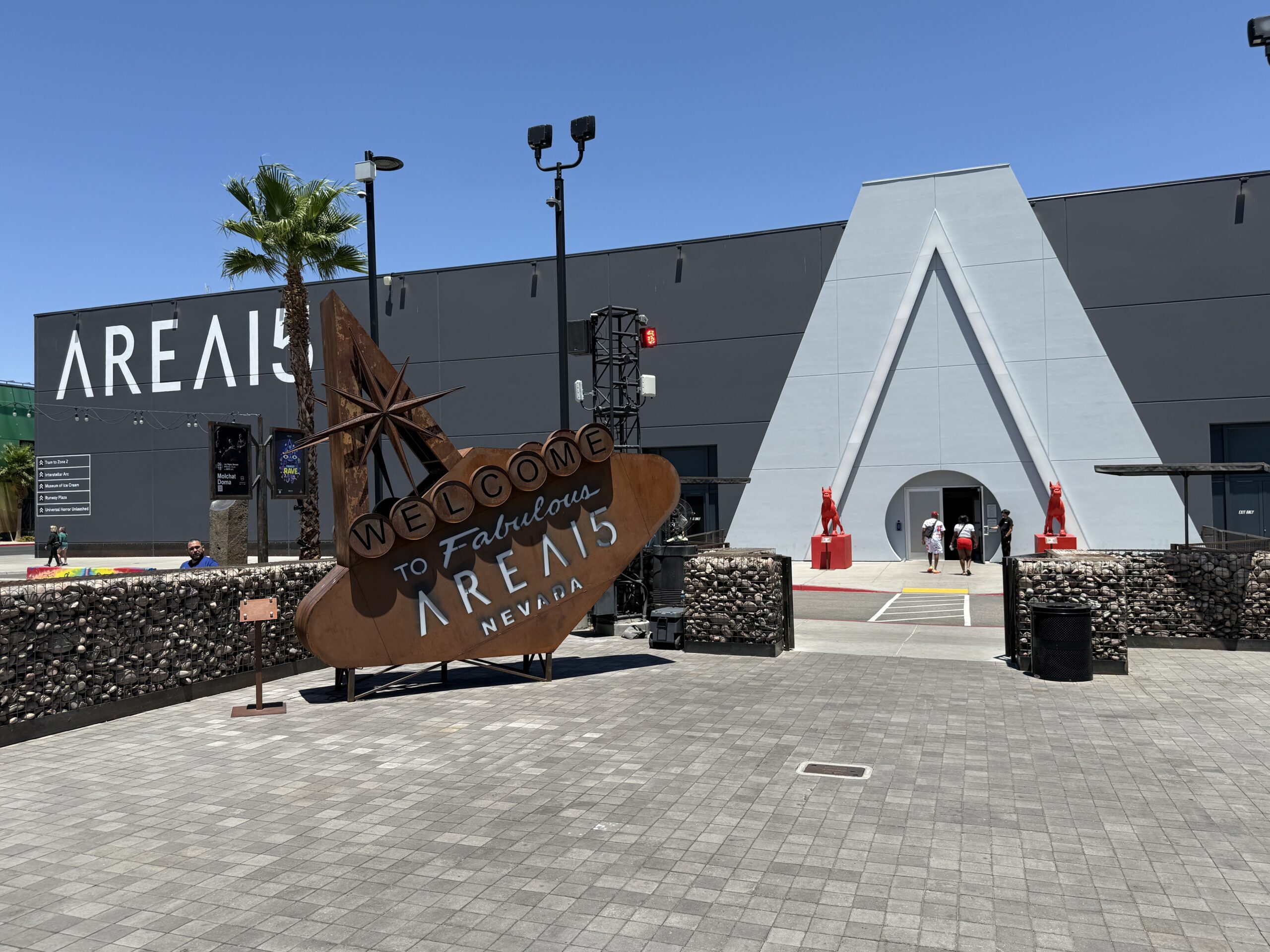 Exterior of Area15, with a mock Welcome to Las Vegas sign in front of the building.
