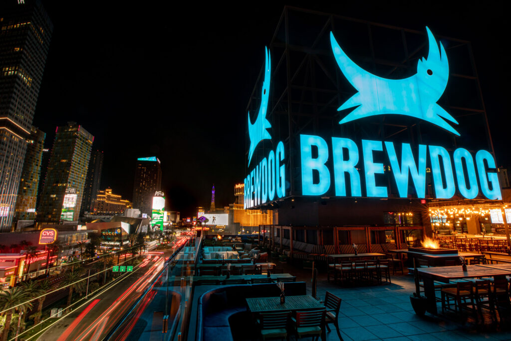 A view of the Strip from Brewdog which also features their illuminated sign above the bar.