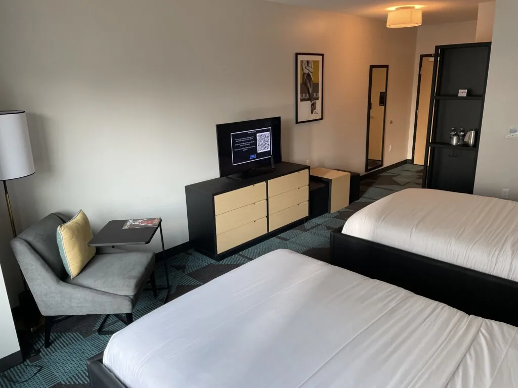 TV and Desk Chair in Downtown Grand's Superior Hotel Room