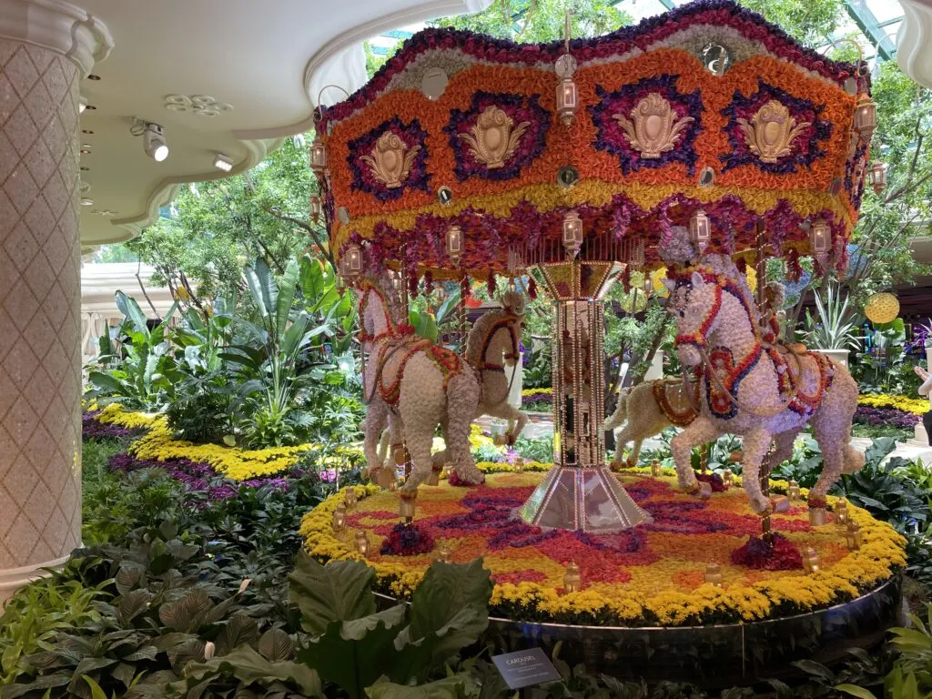 A carousel made of flowers in Wynn's atrium