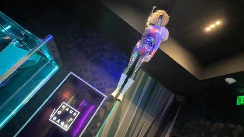 A suspended manequin at Haus of Gaga, wearing one of Lady Gaga's outfits.