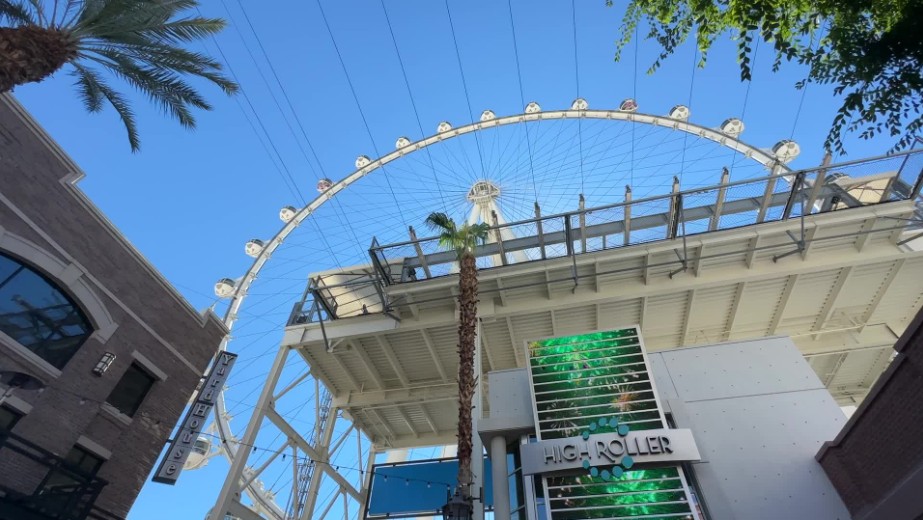 The high roller observation wheel against the backdrop of a blue sky.
