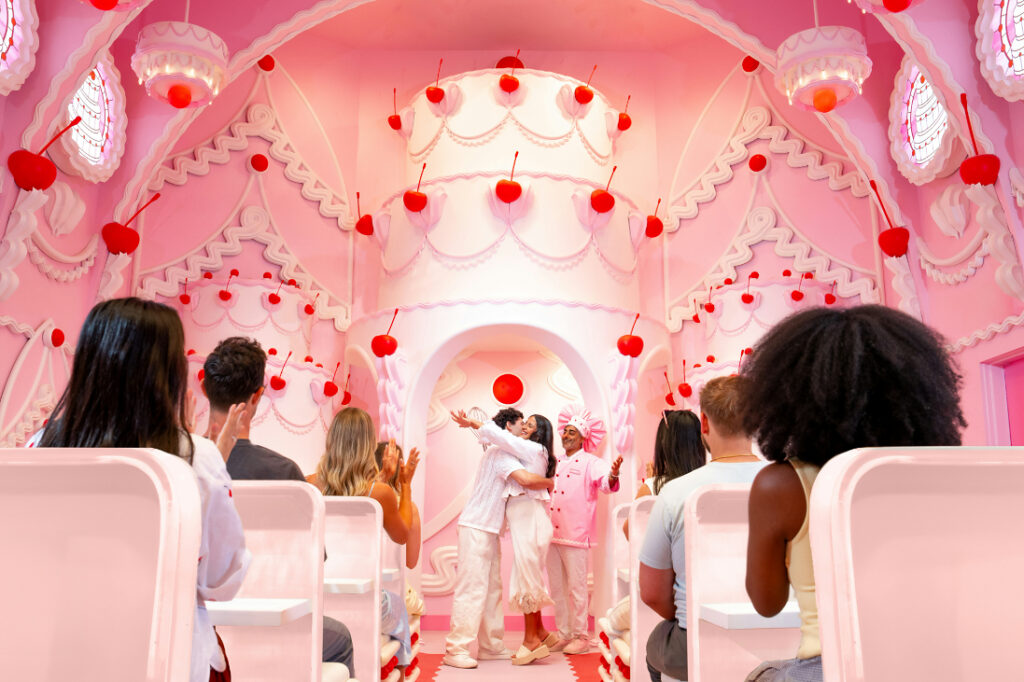 A chapel that appears to be made from pink and white wedding cake.