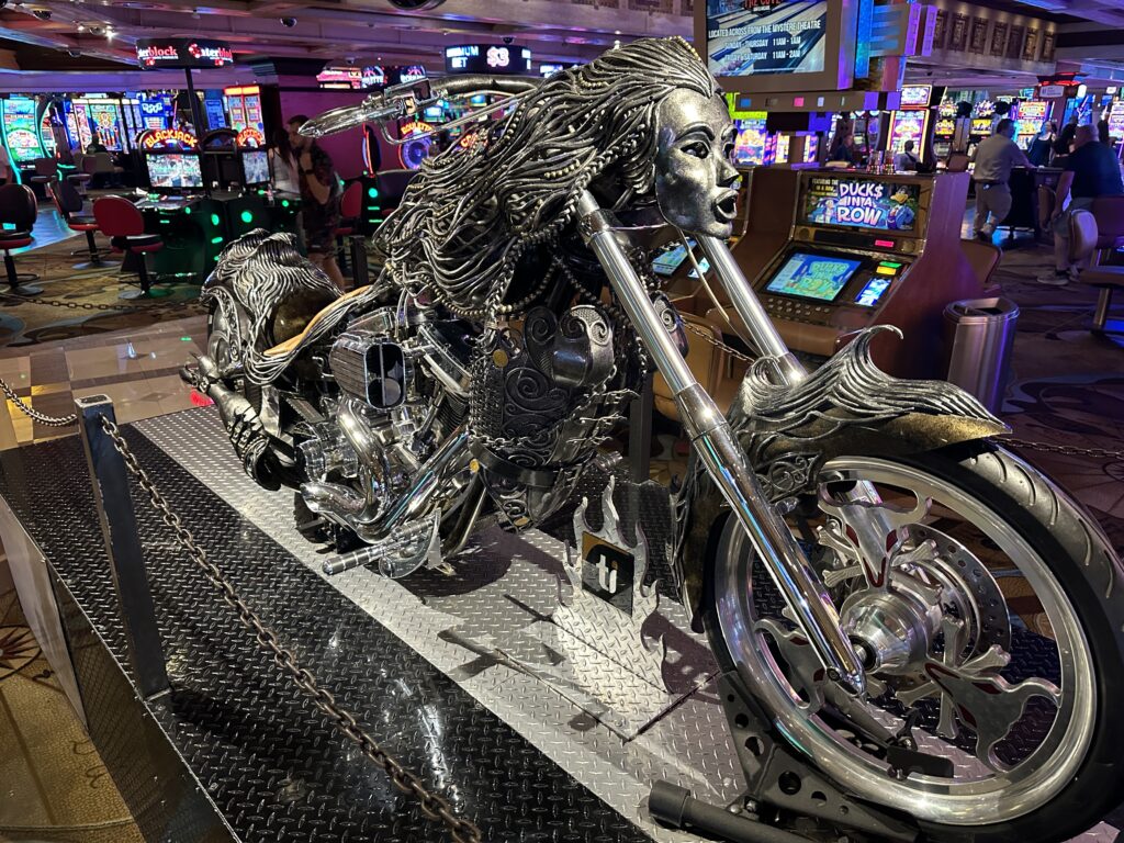 A motorcycle intricately detailed to look like a woman.