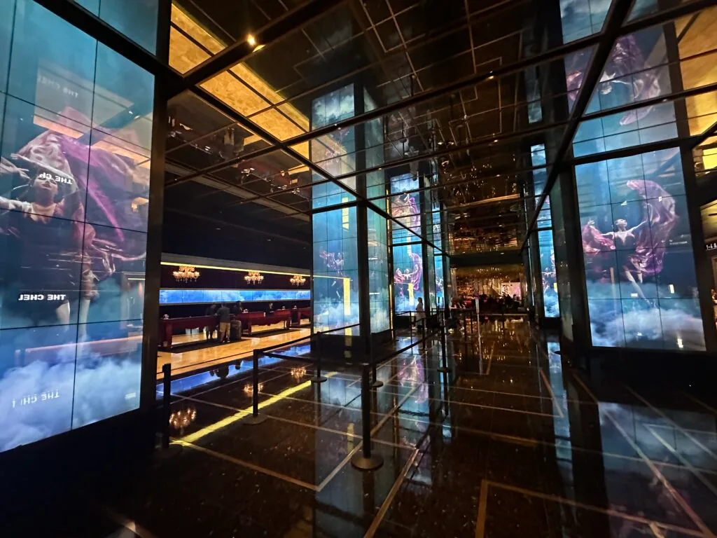 Cosmopolitan's hotel lobby, which has pillars outfitted with LED screens playing media.