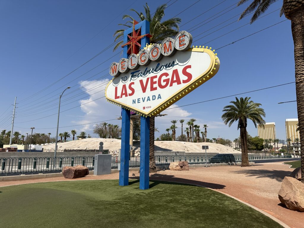 The Welcome to Fabulous Las Vegas sign with a blue sky in the background.