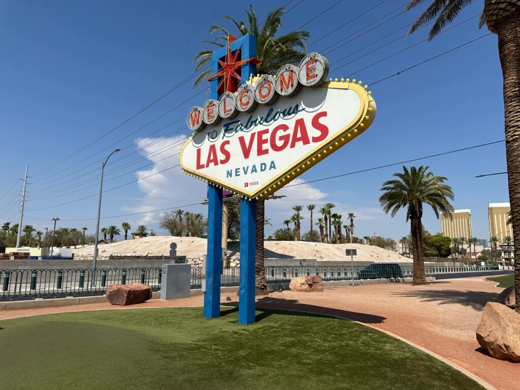 The Welcome to Fabulous Las Vegas sign with a blue sky in the background. 