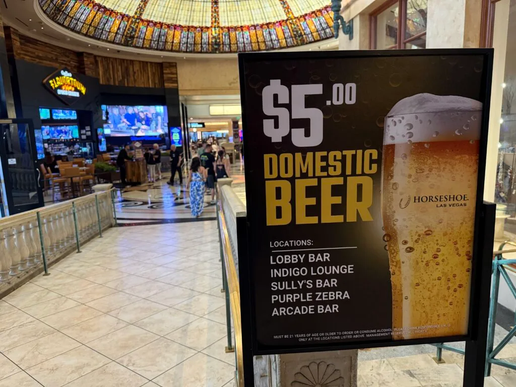 A sign, detailing the $5 beer deal.