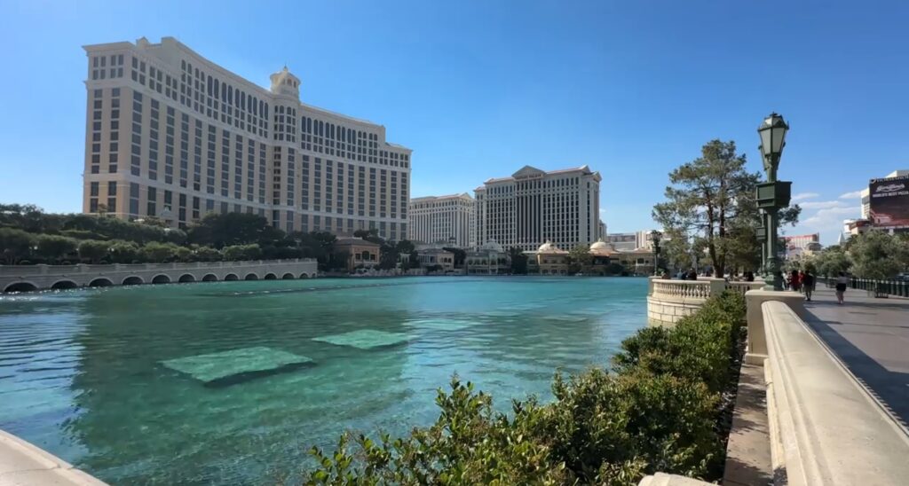 Exterior of Bellagio, with the fountains of Bellagio in the foreground.