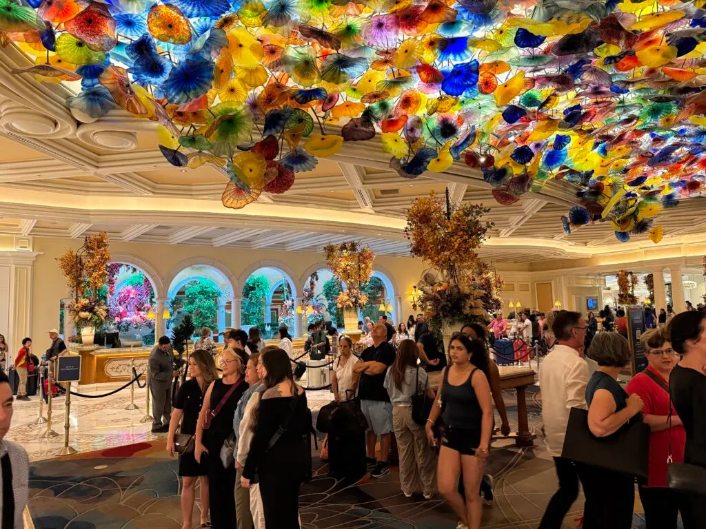 Bellagio's hotel lobby with glass, illuminated flowers on the ceiling. 