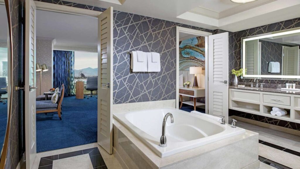 A two person bathtub sitting in the Elite Suite's bathroom