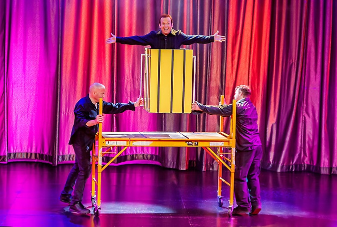 Nathan Burton performing an illusion