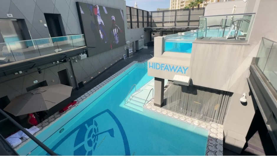 Another angle of the pool which shows a Video wall.