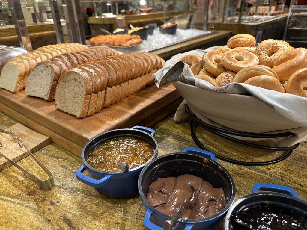 Sliced Bread and bagels displayed.