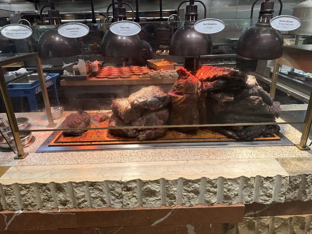 Bacchanal's carving station stocked with prime rib and other large chunks of beef. 