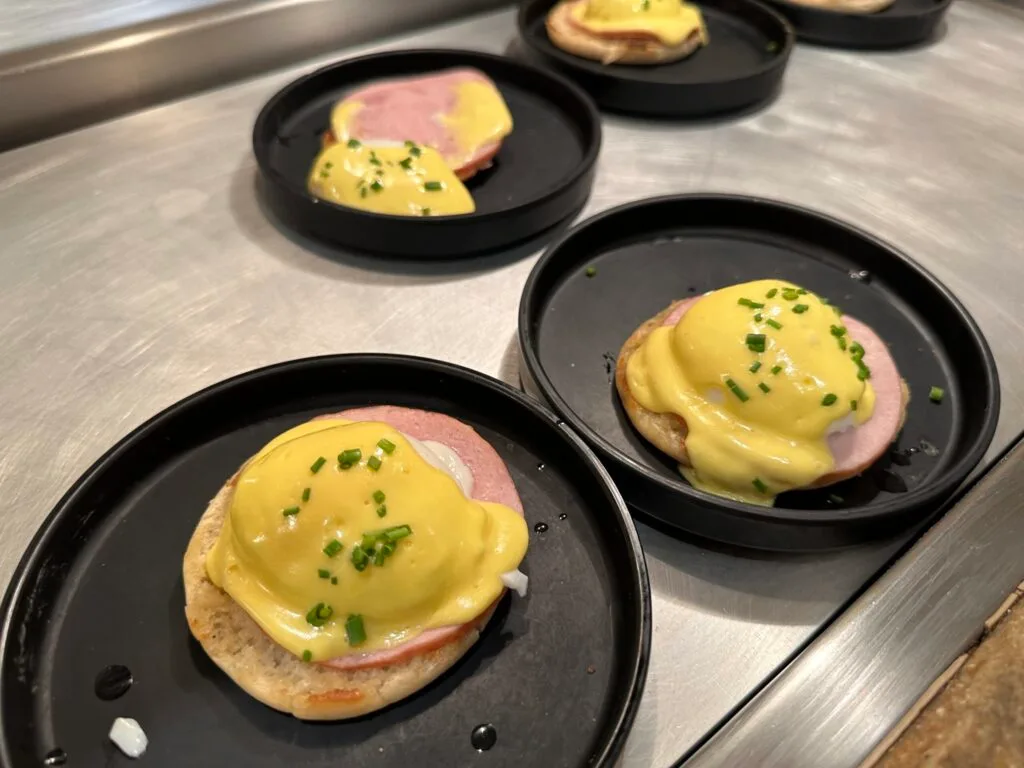 Eggs Benedict individually plated .