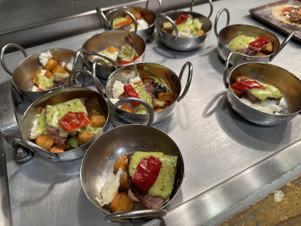 Steak and Egg Hash served in individual bowls .