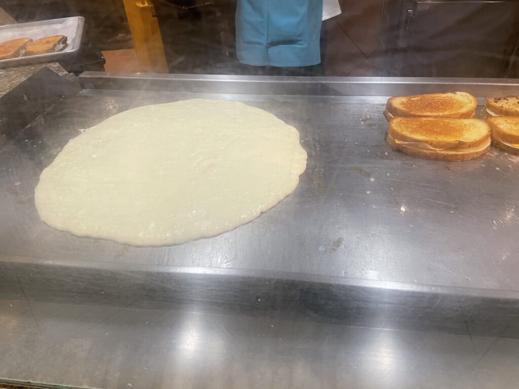 Massive Pancake batter on the griddle
