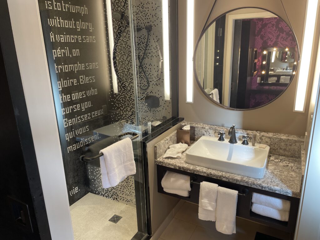 Vanity and shower in the Luxury King Room