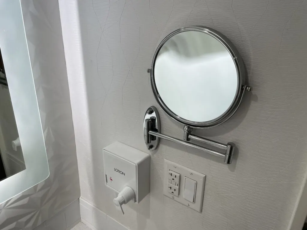 Lotion dispenser and personal mirror