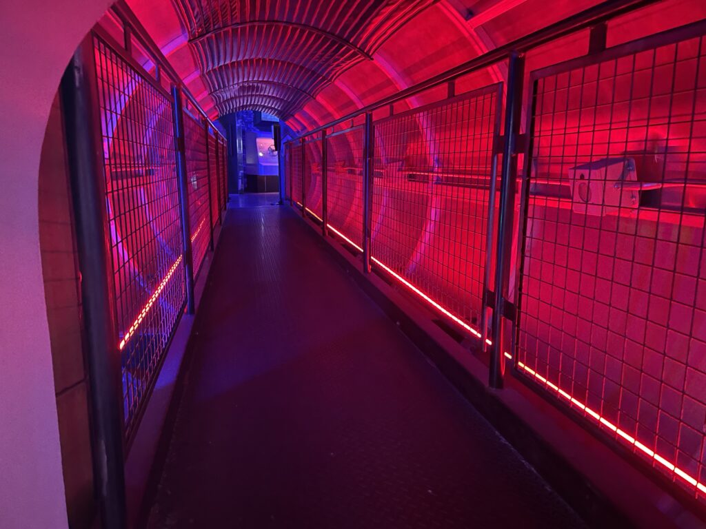 Walkway illuminated by red light