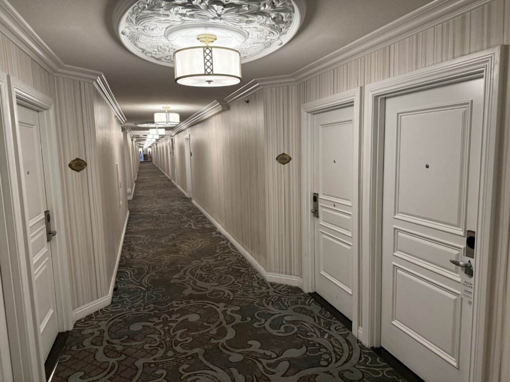 A hotel hallway at Paris, which has Paresian touches and an elegant vibe.